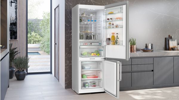 Hausgeräte Kühl-Gefrier-Kombination mit DE Gefrierbereich KG49NAIBT unten Siemens | Freistehende